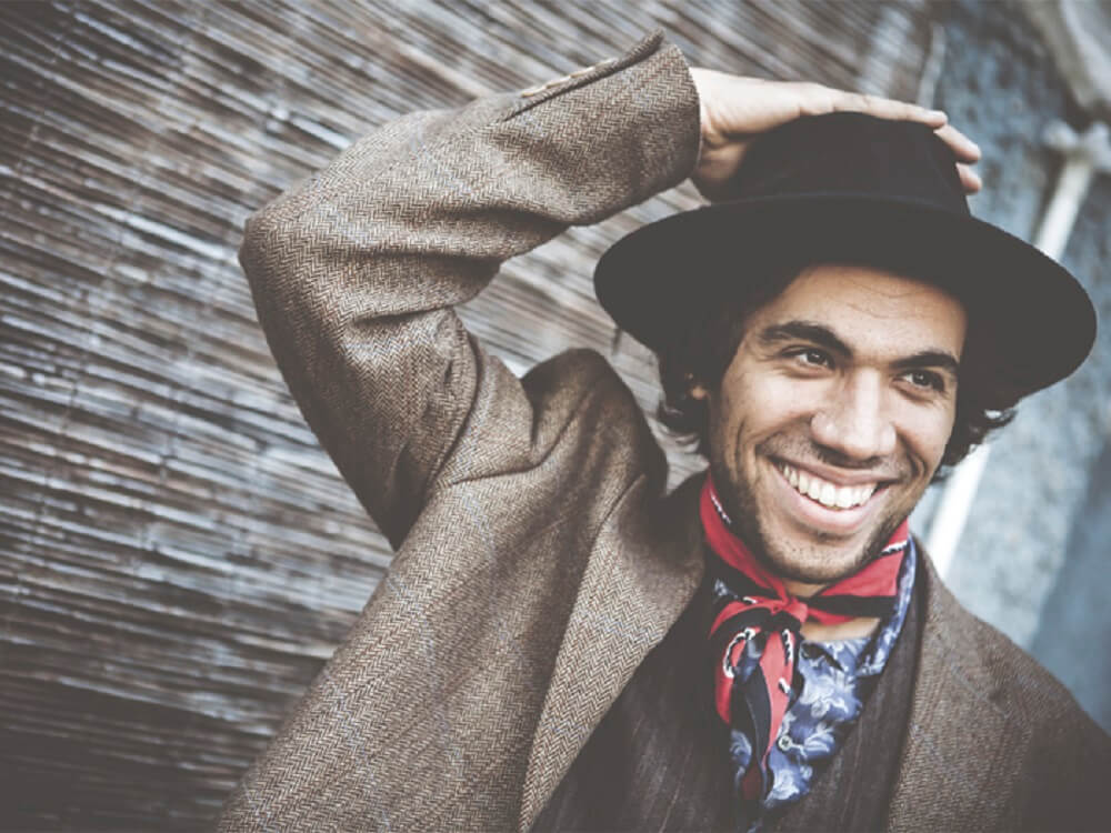 man in hat smiling